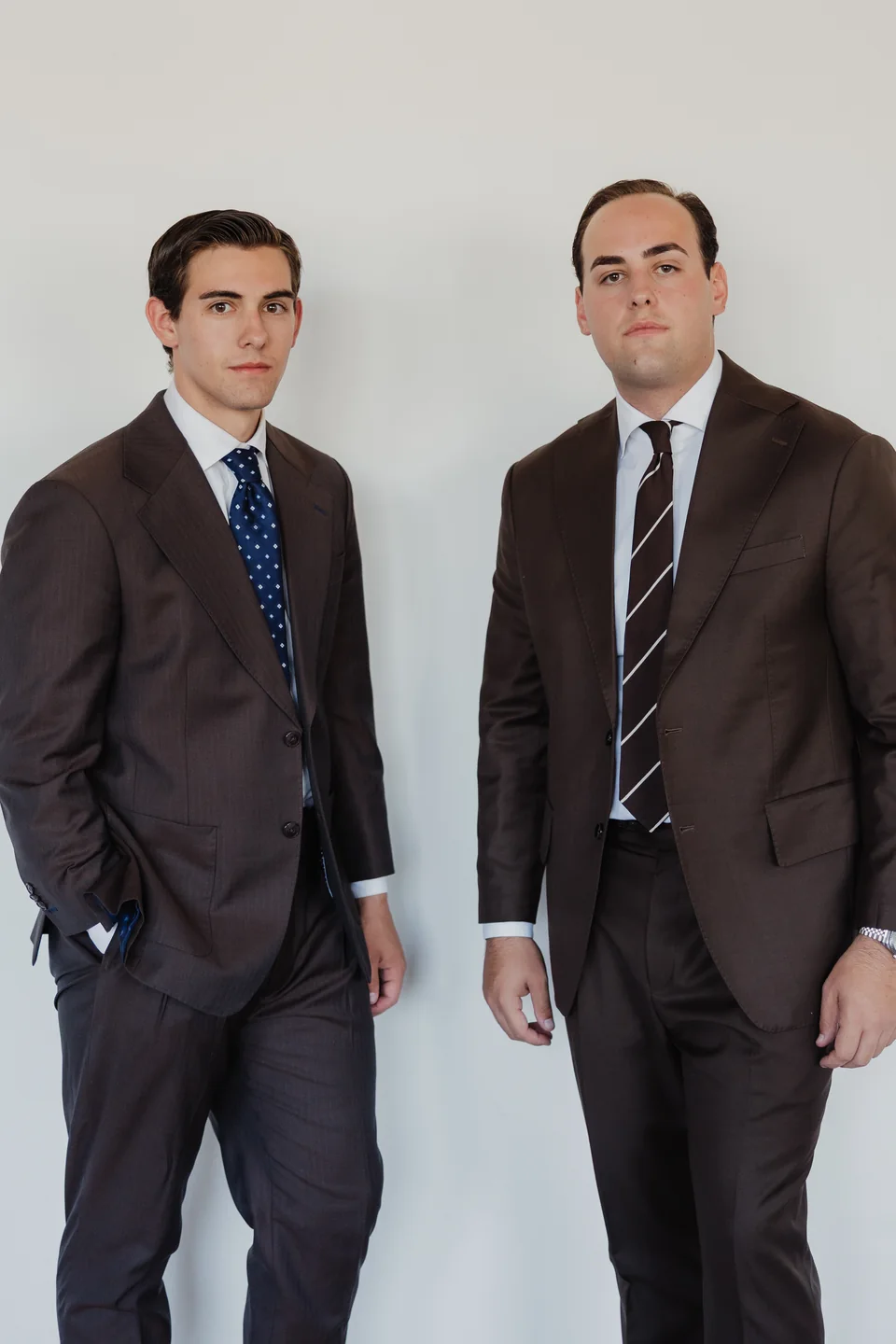 Two suits in a standing composition.